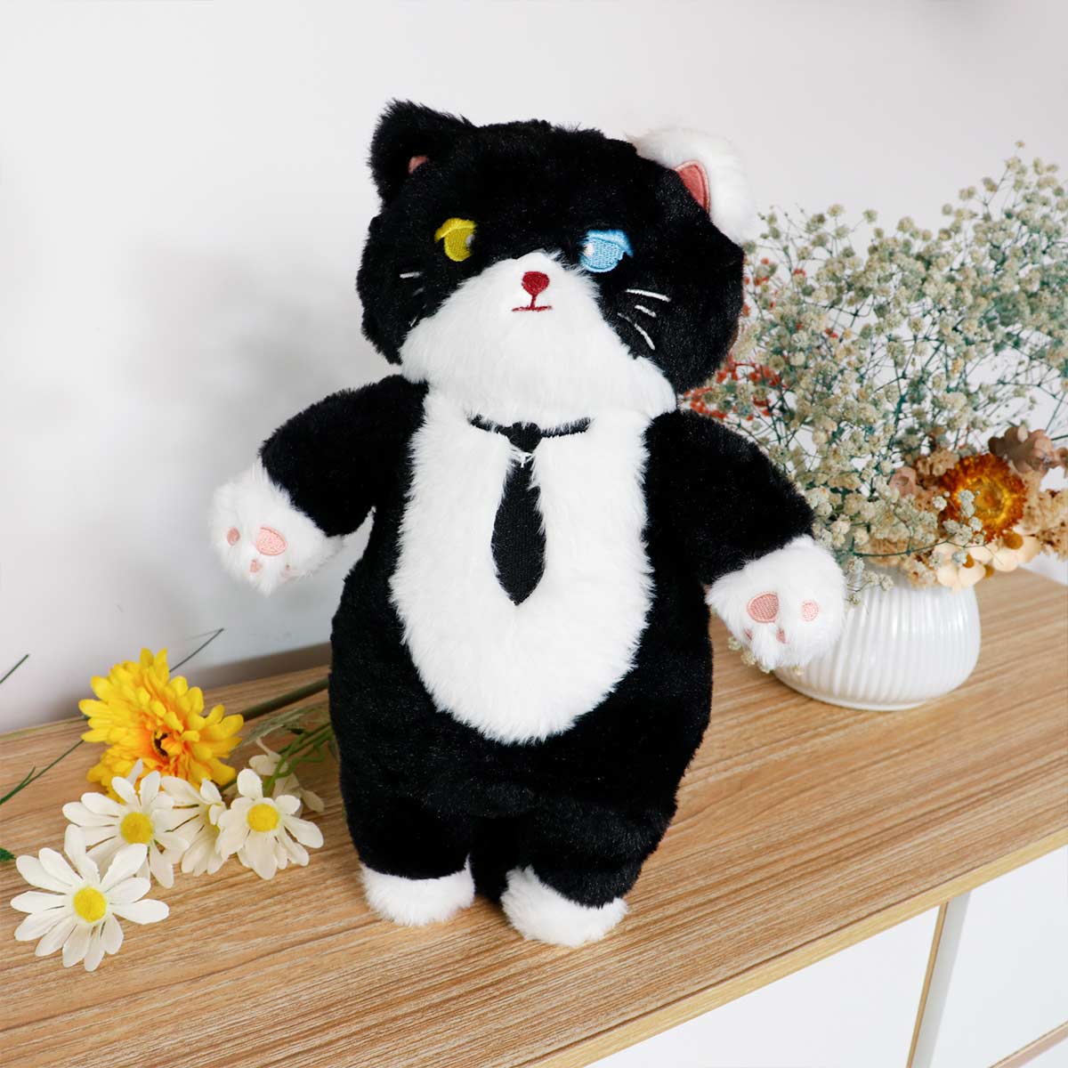 Tuxedo cat stuffed animal top